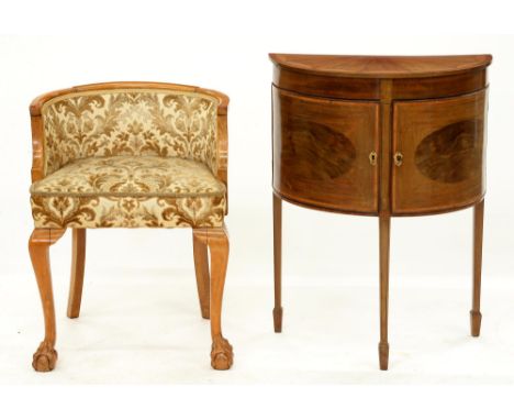 A mahogany sycamore and lime inlaid demilune bedside cupboard, early 20th c, with two doors on three square tapered legs, 78c