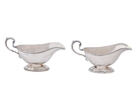 A pair of George V silver sauceboats, 19.5cm l, by C. S. Green &amp; Co Ltd, Birmingham 1928 and 1929, 11oz 8dwt  Light polis