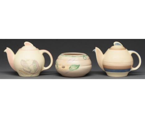 A Susie Cooper earthenware bowl and two art deco Kestrel shape teapots, 1930s, the bowl ribbed and painted with stylised flow