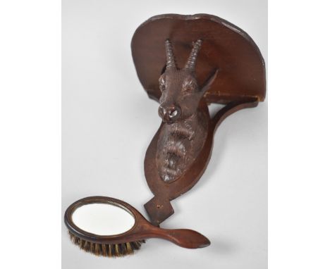 A Small Black Forest Carved Wooden Sconce Shelf with Chamois Support together with a Miniature Hairbrush/Mirror, Sconce 15cms