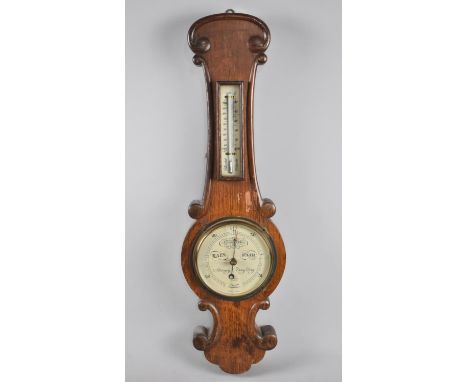 An Edwardian Onion Topped Aneroid Barometer with Thermometer, White Dial Inscribed Tycos London, 62cm wide, Glass Cracked 