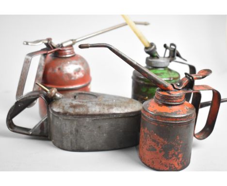 A Collection of Four Vintage Oil Cans 