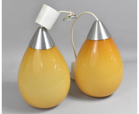 A Pair of Vintage Pendant Amber Glass Cieling Light Fittings with Crome Mounts 