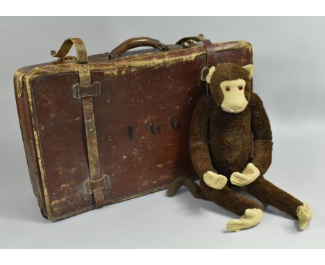 A Vintage Leather Case Monogrammed LGG together with a Vintage Monkey Soft Toy 