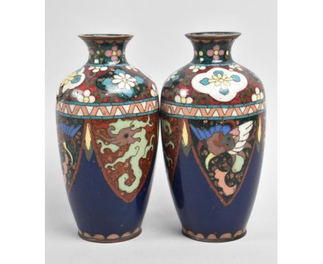 A Pair of Small Japanese Cloisonné Vases decorated in Multi-coloured Enamels, 13cms High 