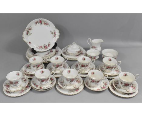 A Royal Albert Lavender Rose Part Service to comprise Nine Cups, Milk Jug, Sugar Bowl, Seven Side Plates, Ten Saucers, Small 