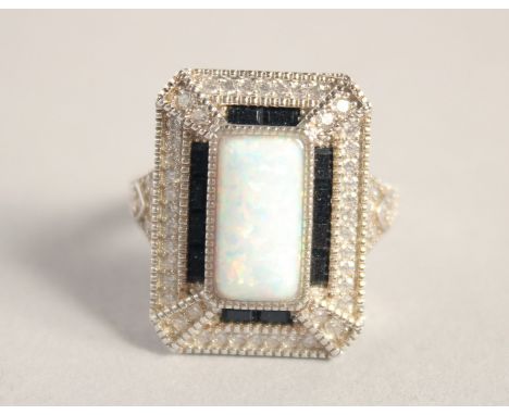 A SILVER DECO STYLE OPAL RING.