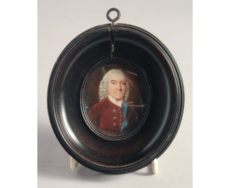 AN OVAL PORTRAIT MINIATURE OF JOHN CHANDLER, 18TH CENTURY. 2ins x 1.5ins in a turned pearwood frame. Prov: Christies, 1991.