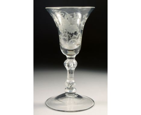 AN 18TH CENTURY WINE GLASS with inverted bell bowl, engraved with vines. 6ins high.