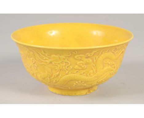 A CHINESE YELLOW PORCELAIN DRAGON BOWL 6ins diameter.