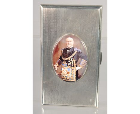 A GOOD LARGE HEAVY ENGINE TURNED CIGARETTE CASE with and oval enamel of The Masonic Grand Master. 5.75ins x 3.25ins 279gms. B