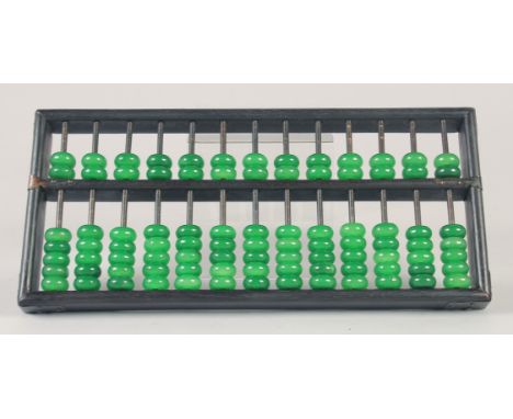 A HARDWOOD ABACUS, with green stone beads.