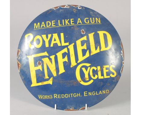 A ROYAL ENFIELD CYCLES ENAMEL SIGN. 11.5ins diameter.