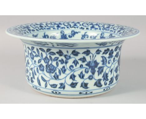 A CHINESE BLUE AND WHITE PORCELAIN WASH BASIN, decorated with flower heads and vine, the interior centre with auspicious symb