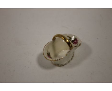 A VINTAGE MINIATURE ROYAL WORCESTER FLORAL BASKET