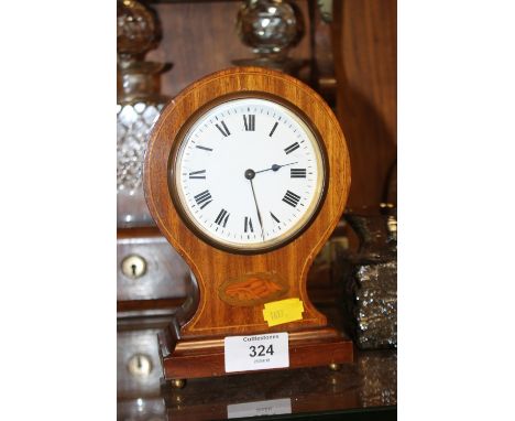 AN EDWARDIAN INLAID BALLOON SHAPED MANTLE CLOCK 