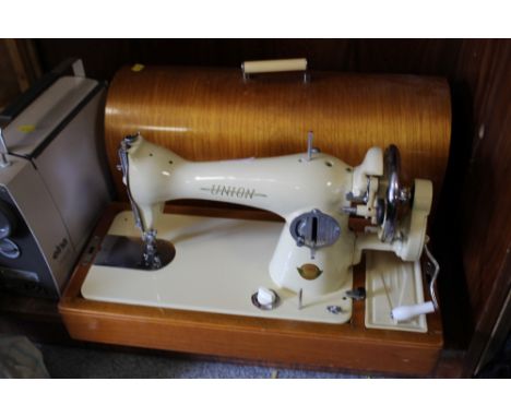 A VINTAGE SATIN WOOD CASED UNION SEWING MACHINE 
