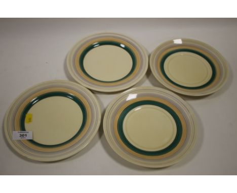A SET OF FOUR CLARICE CLIFF BIZARRE SIDE PLATES