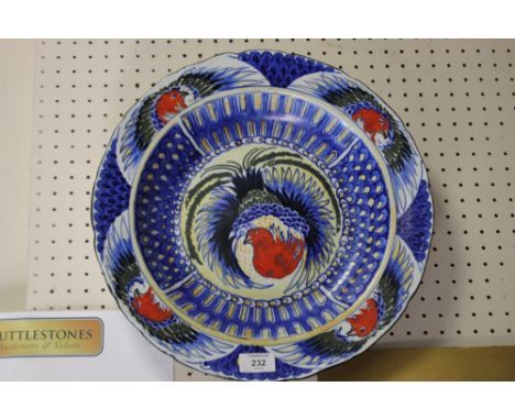 A VINTAGE CAULDON CHINA CERAMIC CHARGER WITH MYTHICAL BIRD DECORATION  