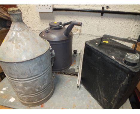 A BP PETROL CAN TOGETHER WITH TWO OTHER EXAMPLES
