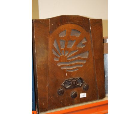 AN ART DECO WALNUT AND BAKELITE PYE RADIO