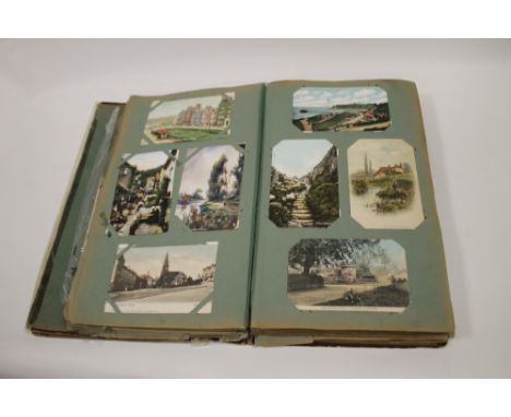 AN ALBUM OF VINTAGE POSTCARDS