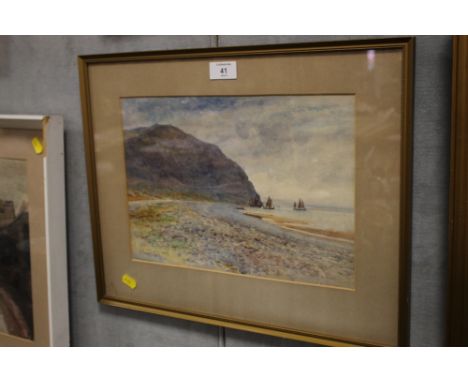 A FRAMED AND GLAZED SEASCAPE WATERCOLOUR SIGNED J CLINTON JONES 