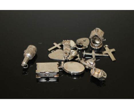 A B BAG OF VINTAGE SILVER CHARMS 