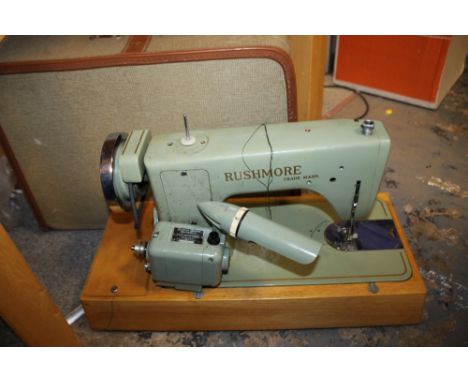 A VINTAGE RUSHMORE SEWING MACHINE 