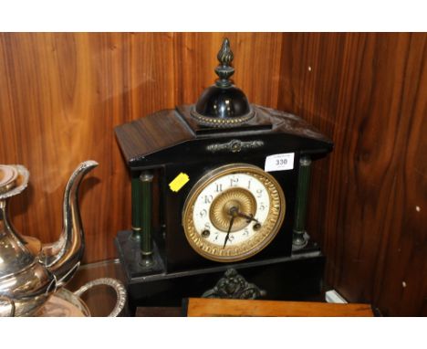 A VINTAGE SLATE MANTLE CLOCK 