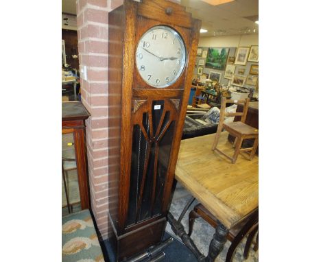 AN OAK CASED ART DECO LONGCASE CLOCK, with triple chrome weights, pendulum, H 185 cm