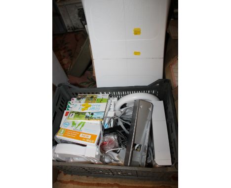 A NINTENDO WII CONSOLE WITH GAMES AND ACCESSORIES TO INCLUDE A WII FIT BOARD 