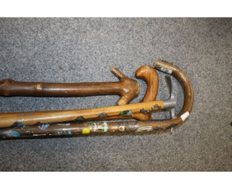 FOUR VINTAGE WALKING STICKS 