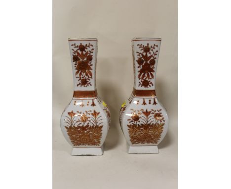 A PAIR OF FLORAL CERAMIC VASES STAMPED AGF TO BASE