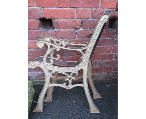 A PAIR OF CAST METAL BENCH ENDS