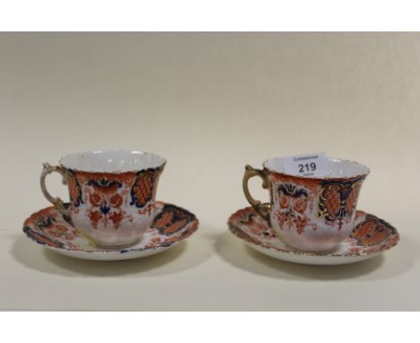 A PAIR OF VINTAGE AYNSLEY CUPS AND SAUCERS