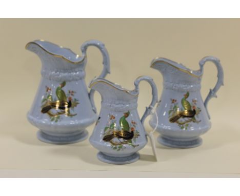 A SET OF THREE GRADUATED RIDGWAY &amp; CO. CERAMIC JUGS, impressed to base, published by W Ridgway &amp; Co., Hanley, October