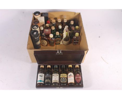 Thirty-six single malt Scotch whisky miniatures to include a boxed set by Rolls Royce containing six miniatures (BOWMORE 10, 