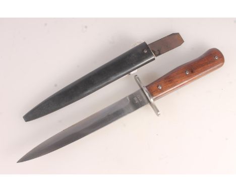 German WWII style boot knife, with blackened metal scabbard, blade length 17cm, knife length 28.5cm.