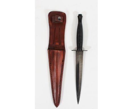 British post WWII Fairbairn Sykes FS commando dagger of typical form having blue steel blade, the guard stamped 'SHEFFIELD EN