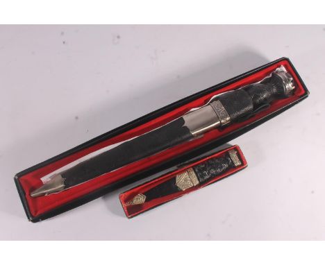 Modern pipers dirk in Celtic Workshop box, 46cm long and a sgain dubh (Skean Dhu) with Nowill &amp; Sons Ltd of Sheffield bla