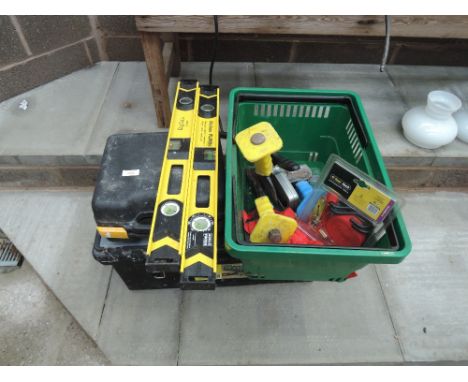 A tool box and contents, an electric sander, spirit levels etc