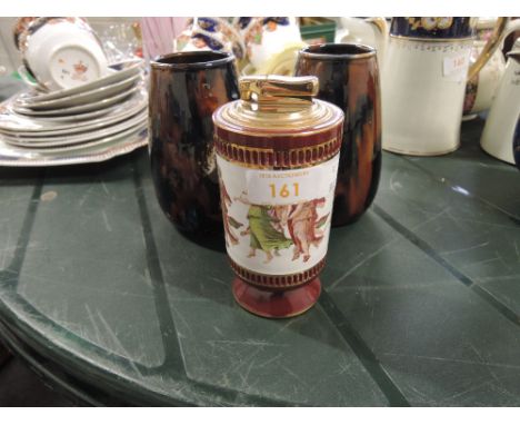 A pair of glazed vases, stamped Richards, London, Matlock and a 'Collibri' lighter in porcelain having transfer nymph decorat