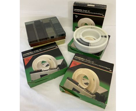 4 boxed Hanimex Rondex 120 rotary magazines containing a quantity of vintage photographic negatives. Together with a boxed ca