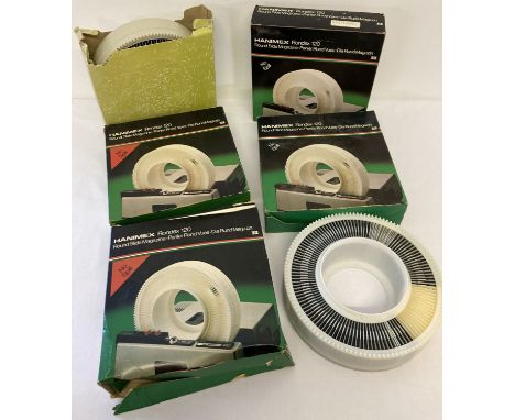 5 boxed Hanimex Rondex 120 rotary magazines containing a quantity of vintage photographic slides. Boxes are marked with sever