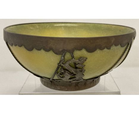 A Chinese green crackle bowl, possibly jade, with metal overlay featuring a dragon &amp; a phoenix. Signature mark impressed 