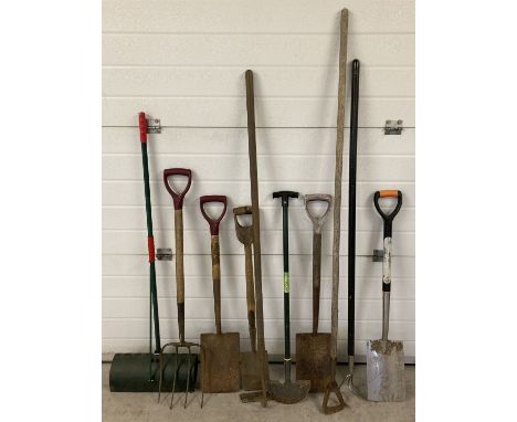 A collection of vintage and modern garden tools to include spades, hoe's, fork and lawn edger.  