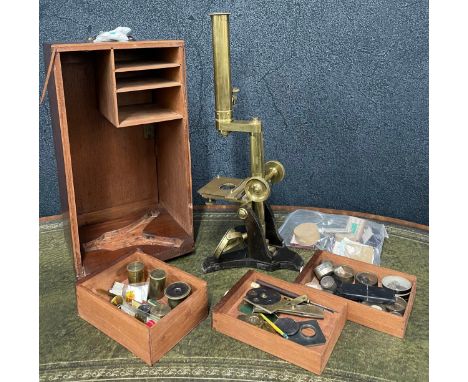 Abraham &amp; Co. Opticians of Liverpool brass and lacquered microscope, within a wooden travel case with a selection of furt