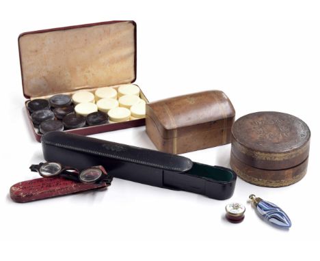 Decorative circular tooled leather box, 4" diameter; together with a domed tooled leather playing card box and a set of gamin