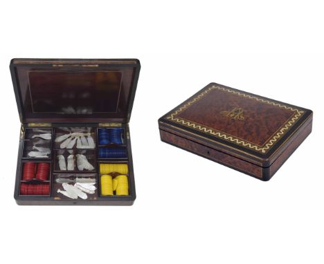 French burr yew wood, kingwood and ebonised games box, the hinged cover with brass inlaid monogram and mother of pearl parque